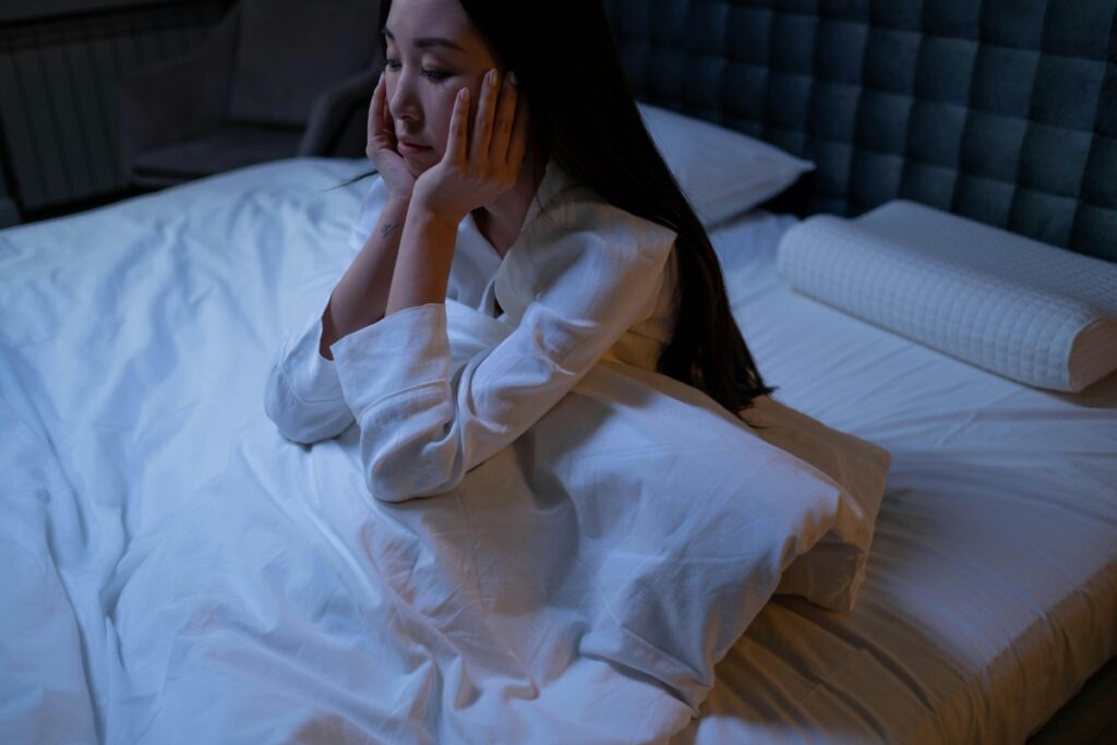 Woman is restless because she needs insomnia treatment